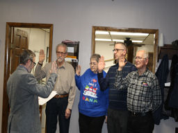 Members being sworn in.